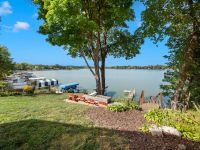 Welcome to your lakeshore retreat, beautiful updates and a resort setting combine to create the perfect place to call home, gorgeous Lake Minnetonka Lakeshore
